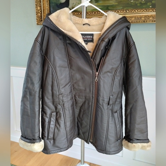 Wilsons Leather Jackets & Blazers - Vintage Wilsons Leather jacket with faux fur lining and hood